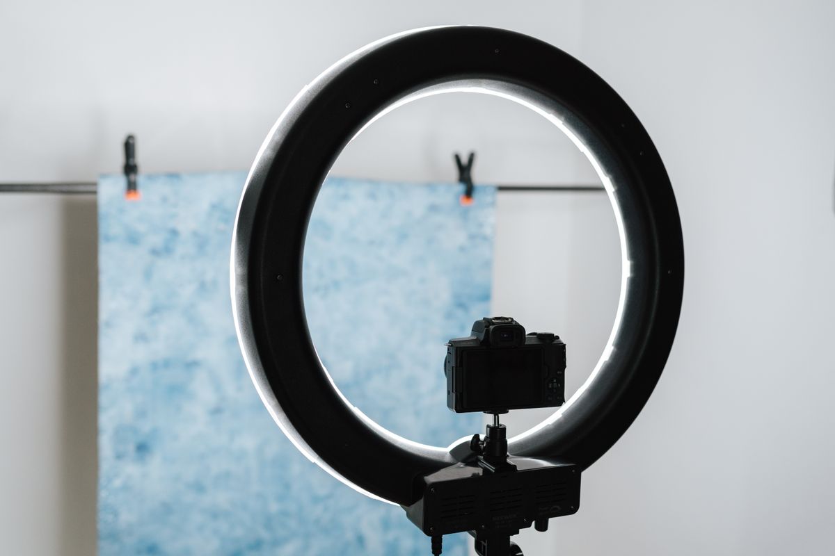 Camera set up next to a studio lamp