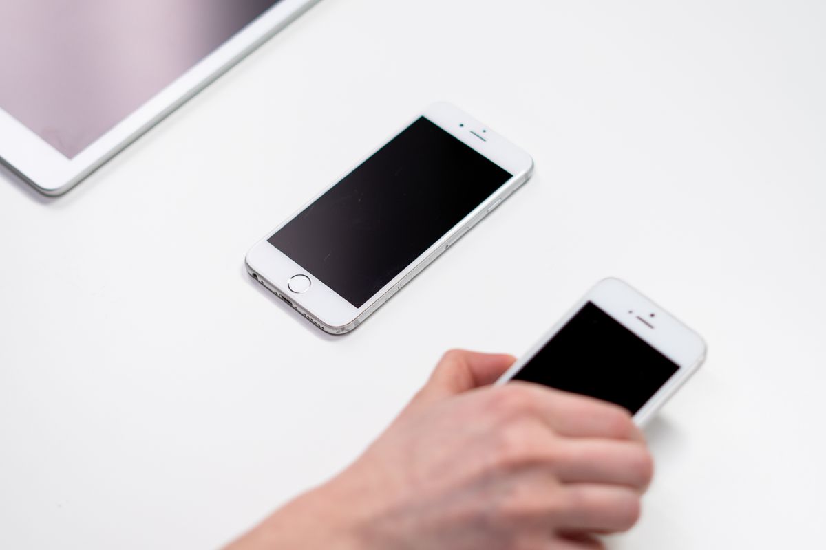 iPhone next to an iPad