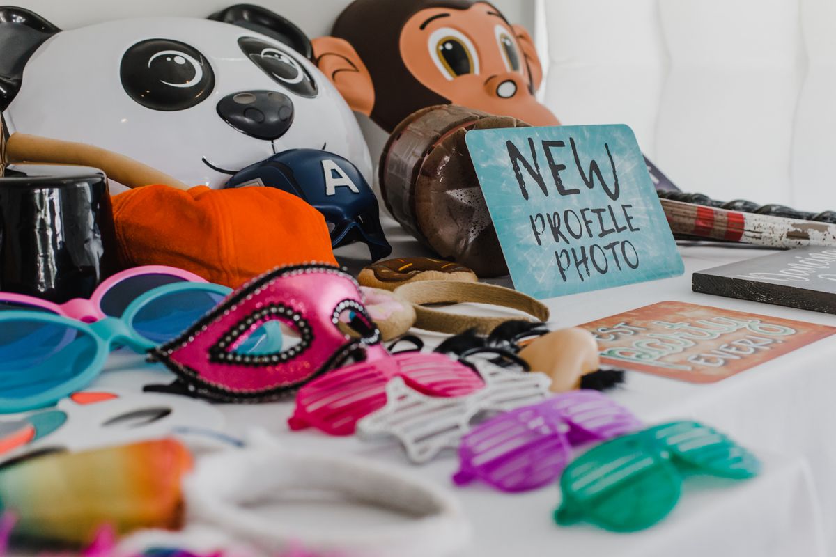 Photo booth props: glasses, masks and signs